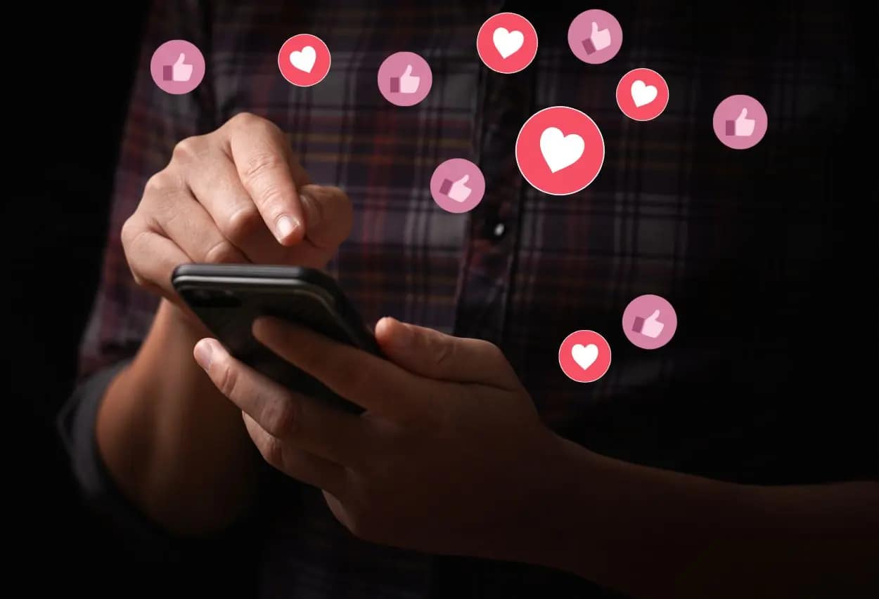 Person engaging with social content as part of an SEO timeline strategy, reflecting audience interaction as an indicator of SEO results.