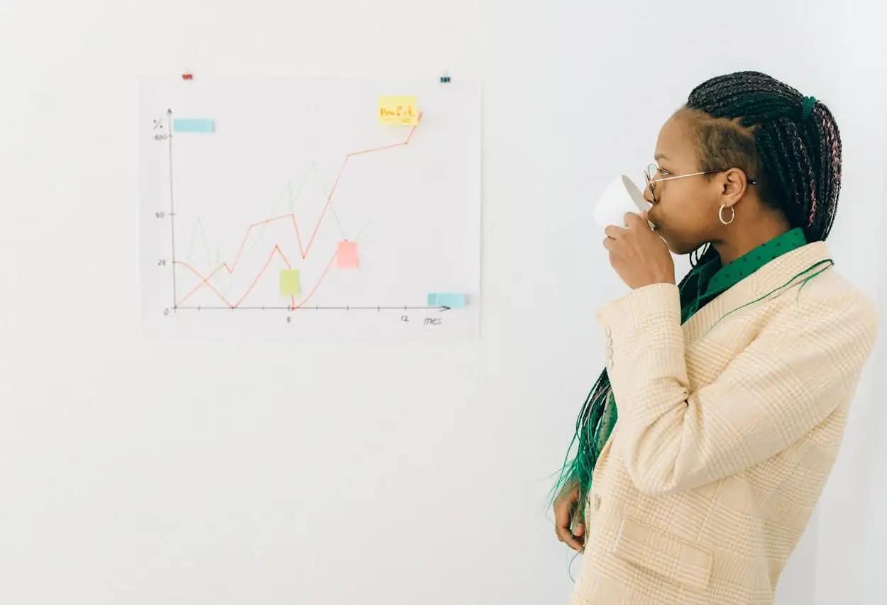 Professional examining growth charts and ROI