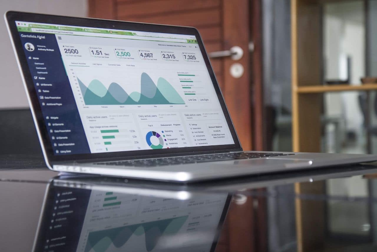 Laptop displaying e-commerce analytics dashboard, crucial for seasonal SEO strategy planning and monitoring.
