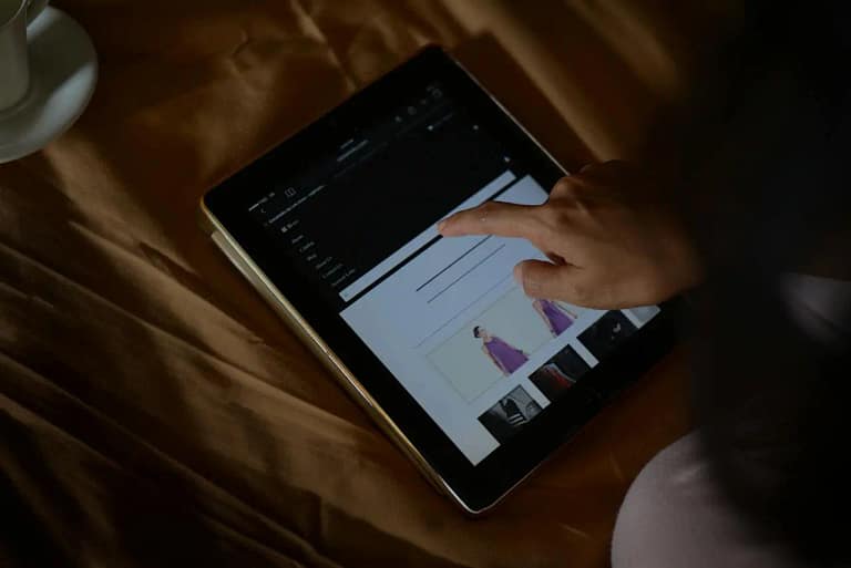 Developer using tablet to oprimize UI and UX for CRO