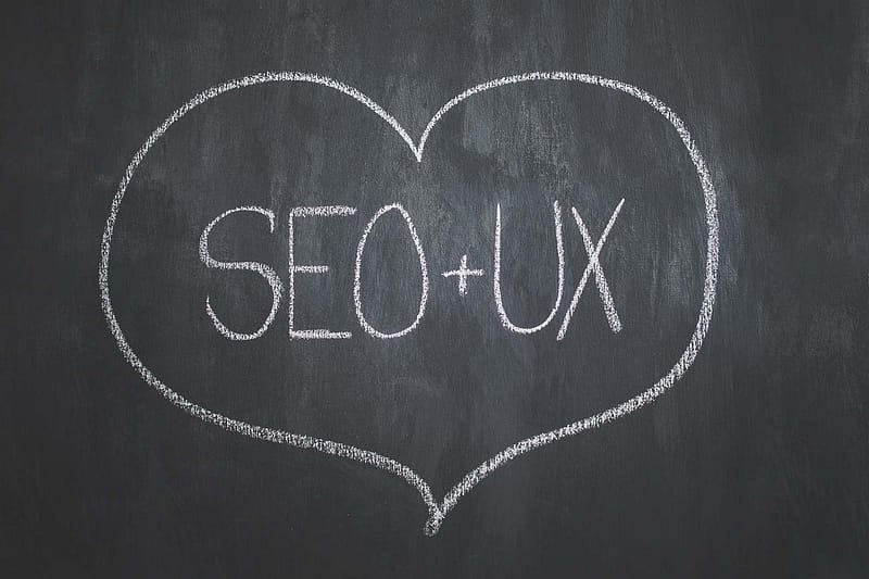 SEO + UX in heart written on a chalk board